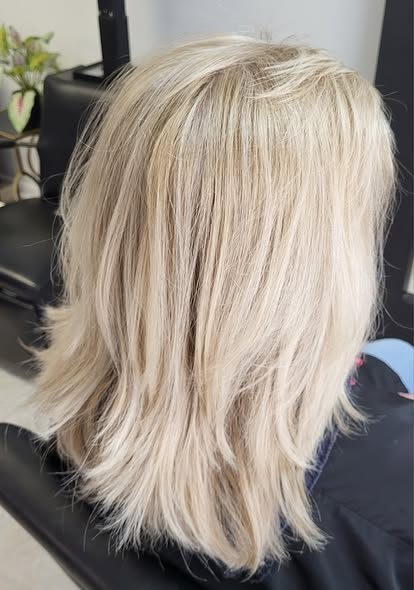 Bright platinum blonde color.
