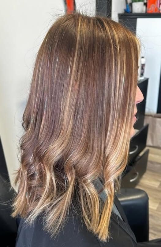 Soft brown balayage, long layers.